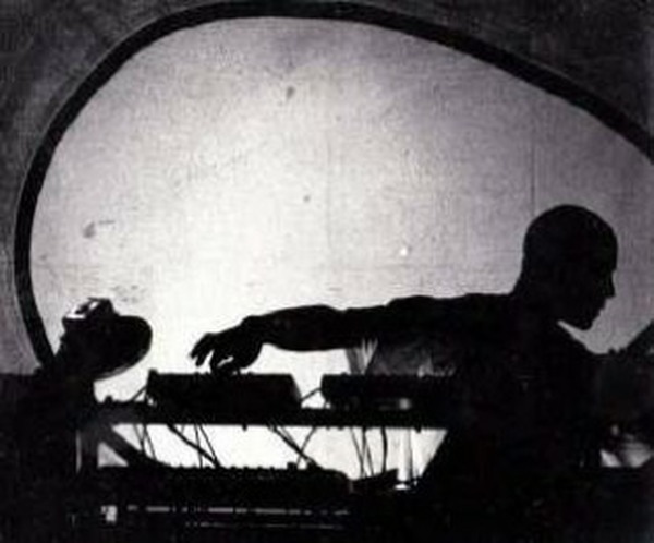 Egebamyasi performing live on stage in black and white